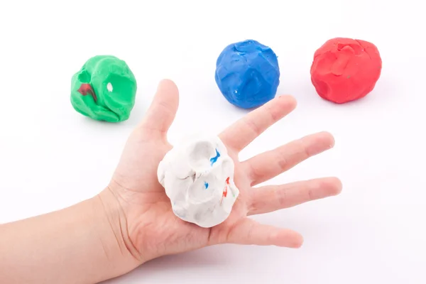 Plasticine and hand — Stock Photo, Image