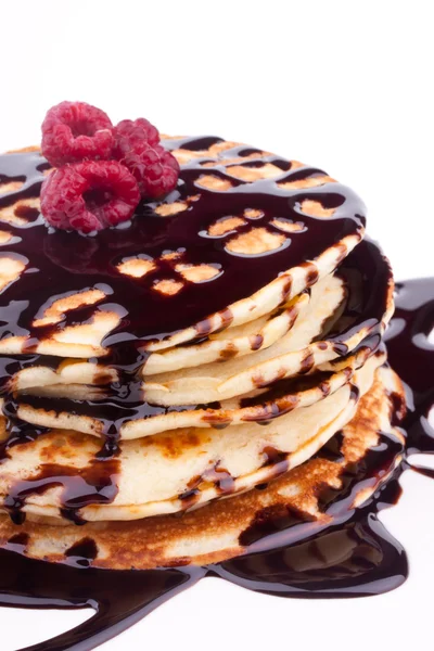 Stack of pancakes with chocolate and raspberry — Stock Photo, Image