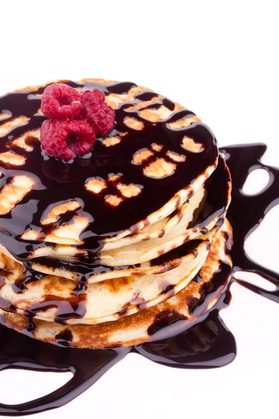 Stack of pancakes with chocolate and raspberry — Stock Photo, Image