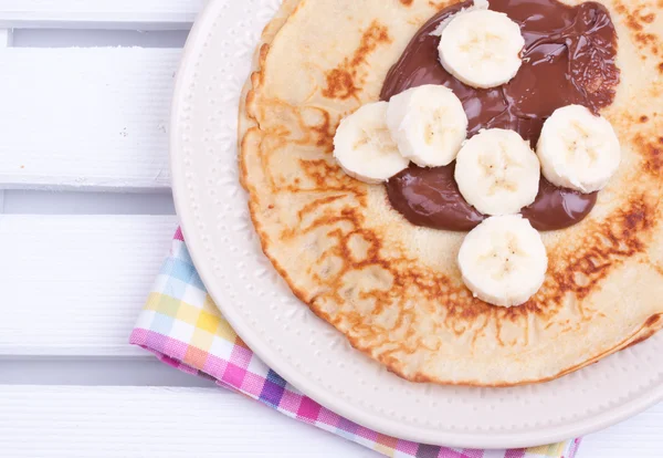 Crepes with chocolate and banana — Stock Photo, Image