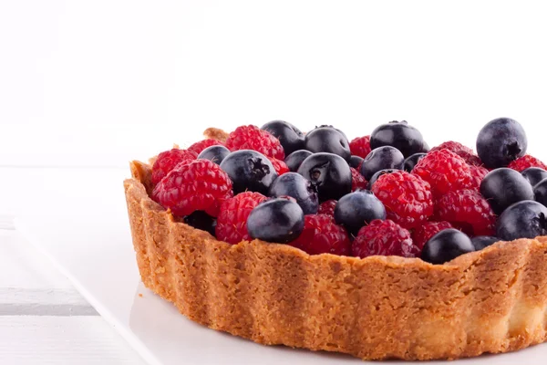 Raspberry and blueberry tart — Stock Photo, Image