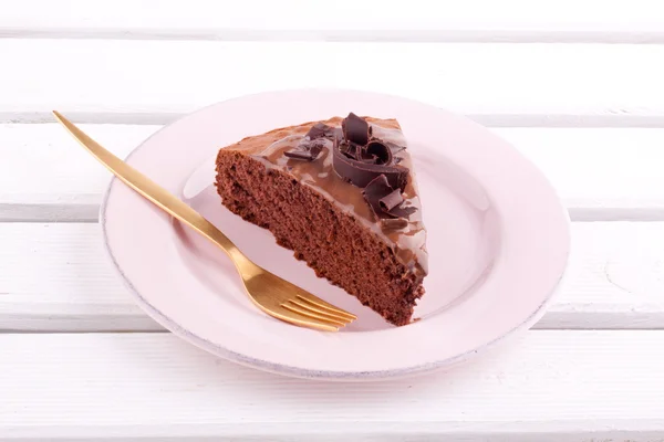 Una rebanada de pastel de chocolate — Foto de Stock