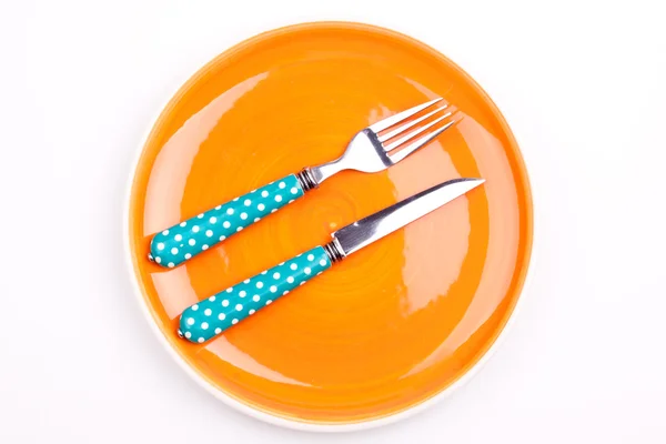 Prázdný talíř, nůž a vidlička — Stock fotografie