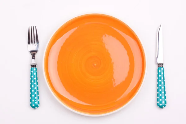 Assiette, couteau et fourchette vides — Photo