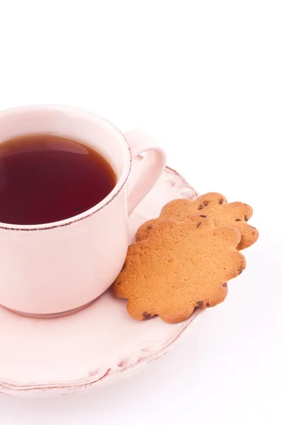 A cup of tea and thin biscuit — Stock Photo, Image