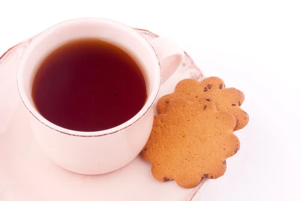 Eine Tasse Tee und dünner Keks — Stockfoto