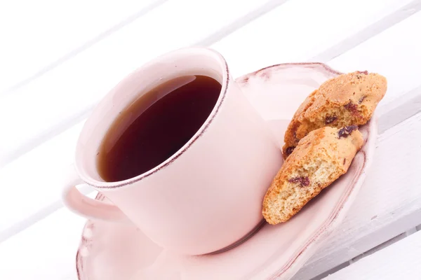 A cup of tea and biscotti — Stock Photo, Image