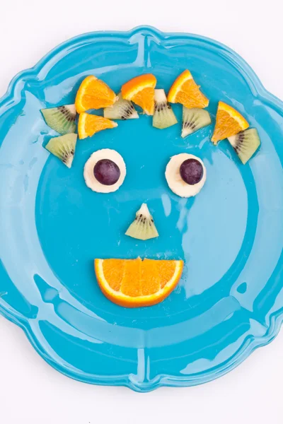 Face on fruits — Stock Photo, Image