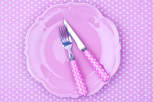 Empty plate and fork,knife