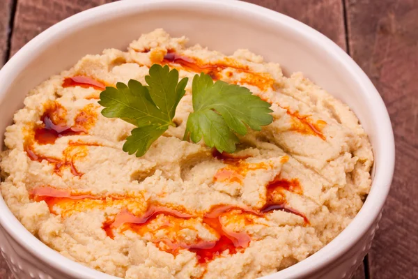 Een kom hummus — Stockfoto