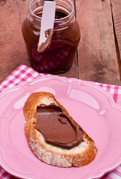 Chocolate cream and bread — Stock Photo, Image