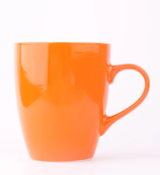 Einen orangefarbenen Becher — Stockfoto