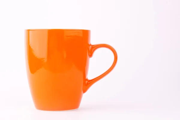 橘黄色的杯子 — 图库照片