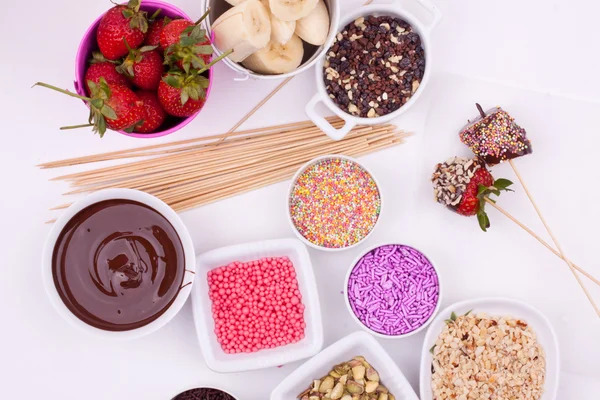 Chocolate fondue with strawberry and banana — Stock Photo, Image