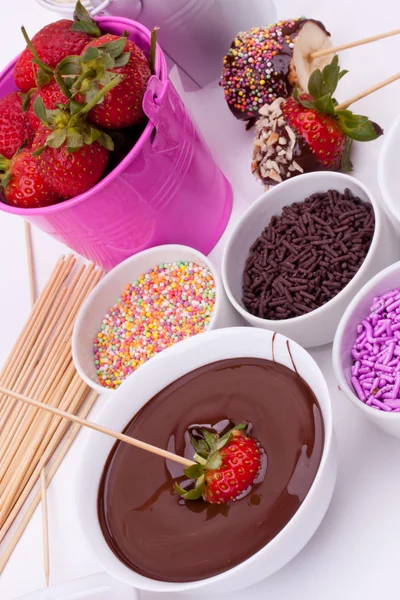Chocolate fondue with strawberry and banana — Stock Photo, Image