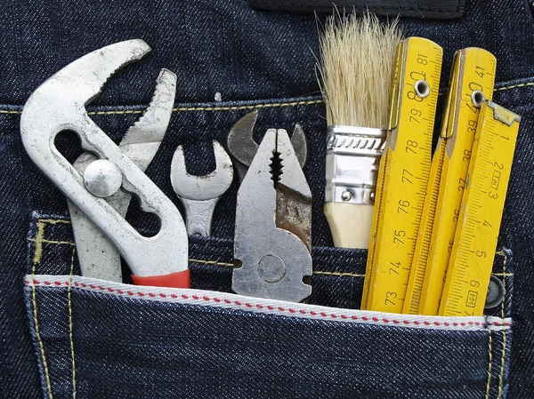 Verktyg och jeans ficka — Stockfoto