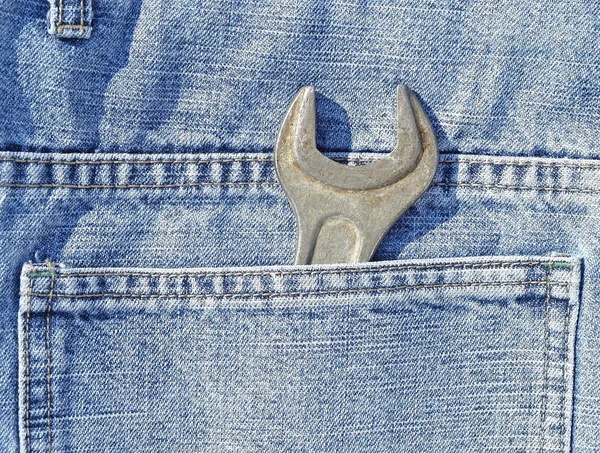 Lug wrench in a pocket — Stock Photo, Image