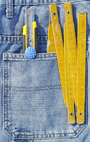 Tools in jeans pocket — Stock Photo, Image