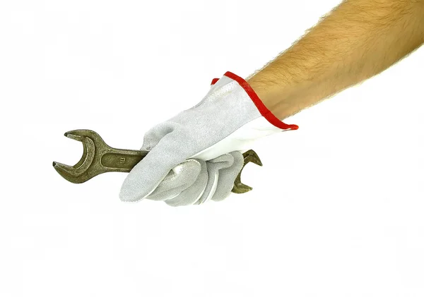 Hand holding spanner — Stock Photo, Image