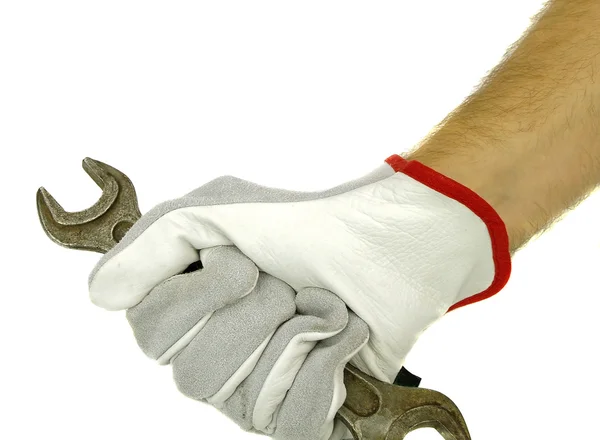 Hand holding spanner — Stock Photo, Image