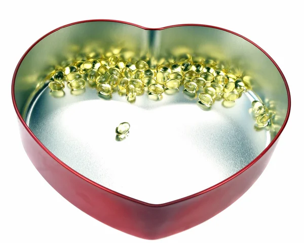 Heart filled with omega 3 — Stock Photo, Image