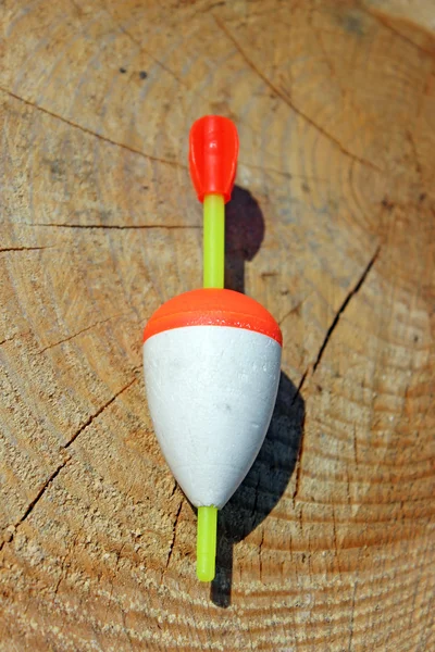 Buoy fishing on a wooden background — Stock Photo, Image