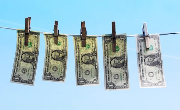 1 dollar bills hanging on a clothesline — Stock Photo, Image