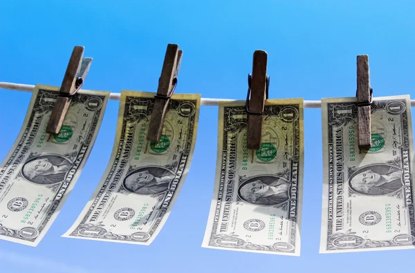 1 dollar bills hanging on a clothesline — Stock Photo, Image