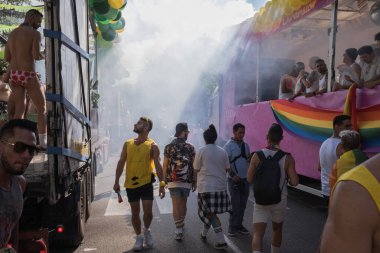 Barcelona, Spain - June 25, 2022: Pride 2022 celebration. Glances reciprocated in a colorful and festive atmosphere