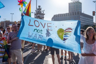 Barcelona, Spain 06-25-2022: Pride Barcelona 2022 celebration in Plaza de Espana. A group sympathizing for gay rights displayed a banner saying 