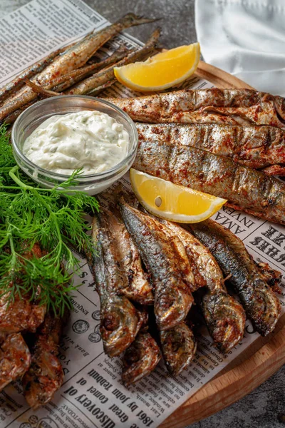 Appetizer Restaurant Fried Sprat Wooden Plate Lemon Cream Sauce Gray — Zdjęcie stockowe