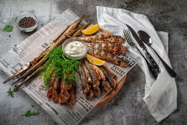 Appetizer Restaurant Fried Sprat Wooden Plate Lemon Cream Sauce Gray — Zdjęcie stockowe