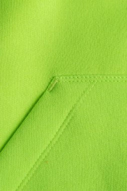 Kapüşonlu kumaş. Kapüşonlu kapüşonlu, kahverengi, tekstil, sıcak kumaş, makro arka plan. Yeşil renk