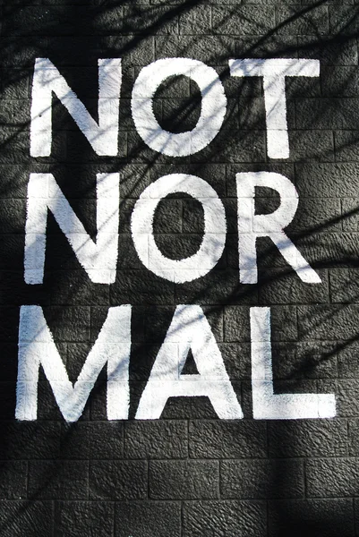 Not normal sign painted on the wall — Stock Photo, Image