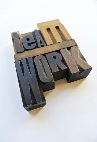 Woodtype letters showing teamwork — Stock Photo, Image