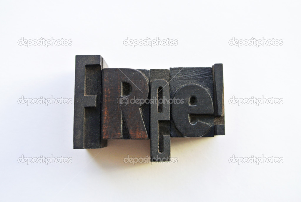 Woodtype letters forming free word