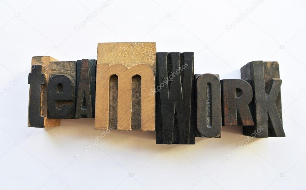 Woodtype letters teamwork
