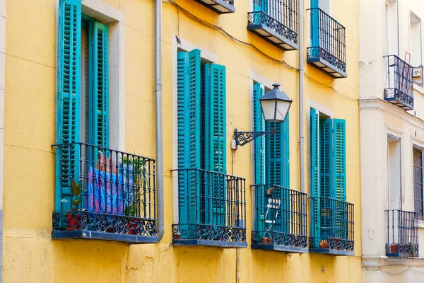Tiny Balconies Vivid Blue Shutters Vibrant Yellow Wall Weathered Facades — Stock Photo, Image