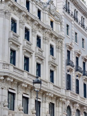 Elegant modernist building with art deco details downtown Madrid, Spain. Vertical photo.