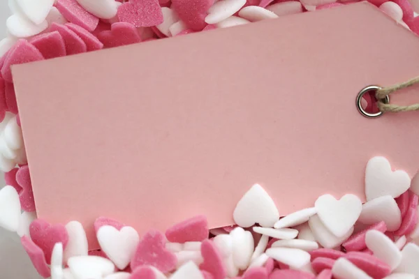 粉红色空标签在甜蜜的心 — 图库照片