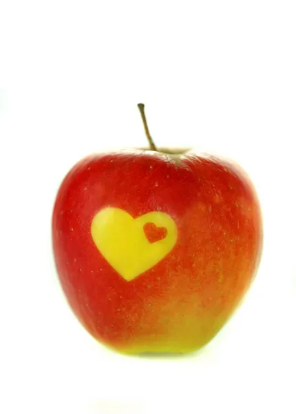 Apple with heart sign — Stock Photo, Image