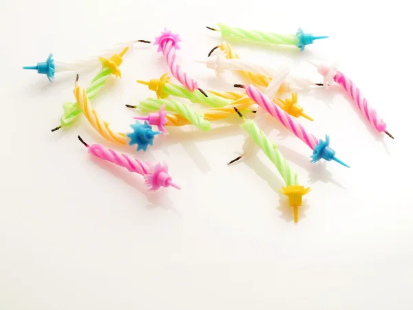 Row of colorful blown out birthday candles — Stock Photo, Image