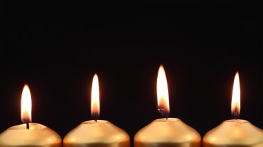 Gold candles with copy space