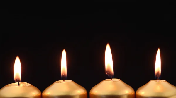 Gold candles with copy space — Stok fotoğraf