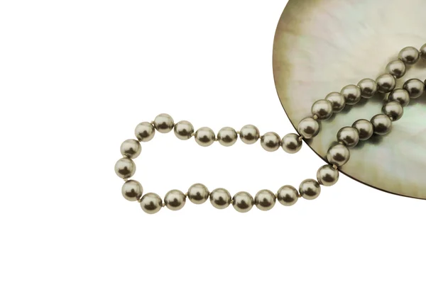 Pearls on seashell — Stock Photo, Image