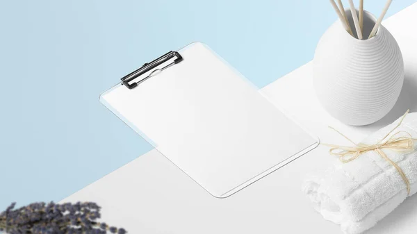 Image with clipboard, lavender flower, white towel, aromatic dispenser and background in colors.