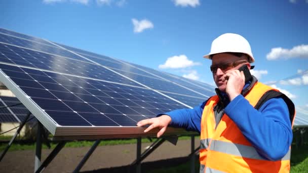 Male Worker Hardhat Standing Solar Panels Talking Phone Portrait Industrial — 图库视频影像