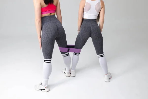 Two Young Women Beautiful Buttocks Leggings Fitness Elastic Band Sports — Stock Photo, Image