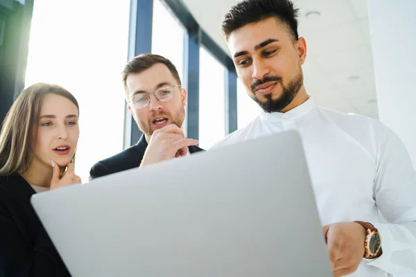 Three Office Workers Thinking New Project While Looking Laptop — Stock Photo, Image