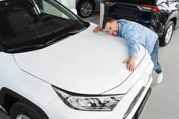 Man Hugging His New Car — 스톡 사진